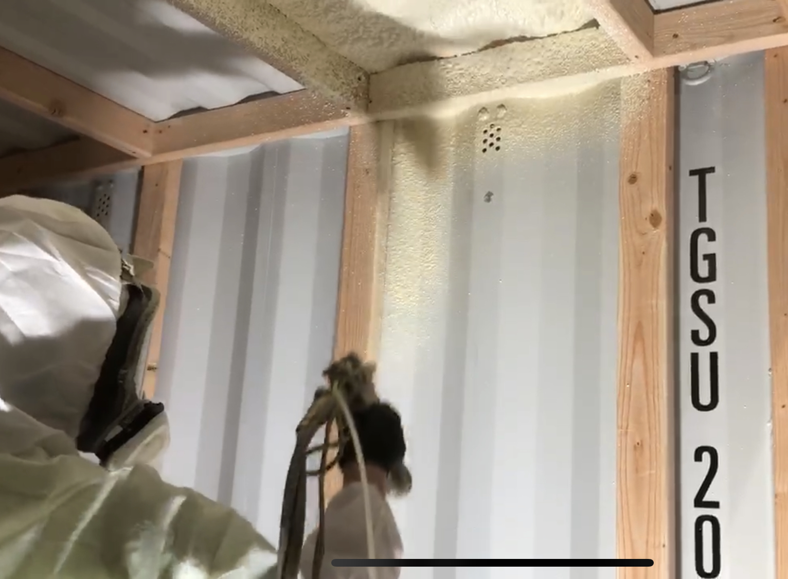 Applying spray foam insulation