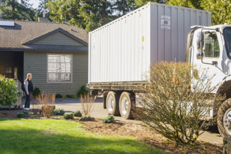 man viewing getSimpleBox container truck