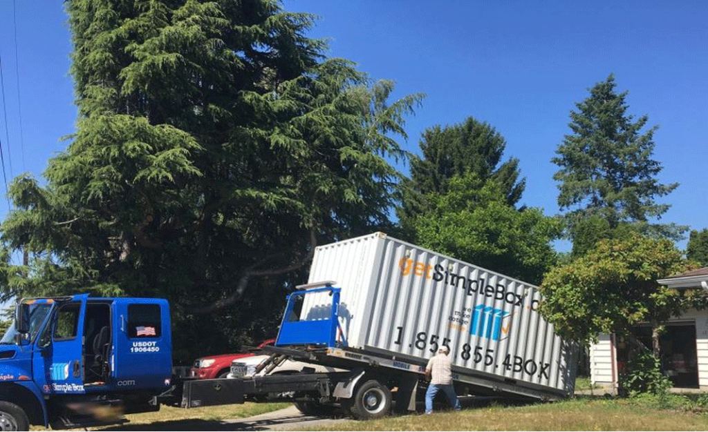 Get Simple Box shipping container being dropped off at a residential customer