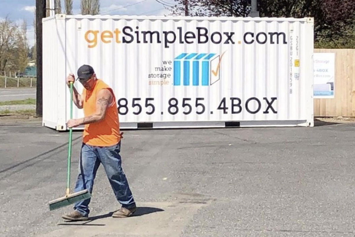 Get Simple Box representative sweeping in front of the storage yard