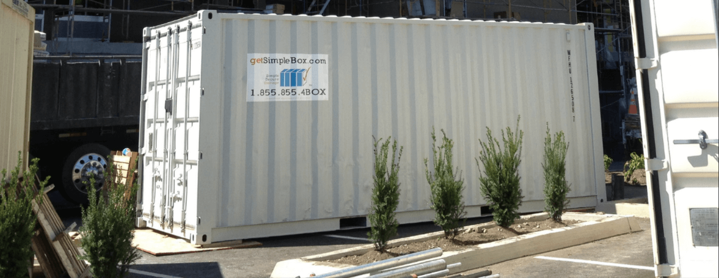 40 foot shipping container delivered in a parking lot