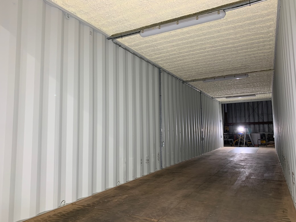 roof spray foam insulation for a shipping container and electrical lights