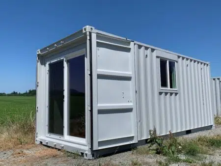 20 foot shipping container modifications: sliding door and small window
