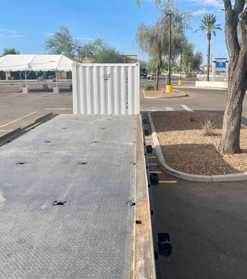 Moving containers being delivered.