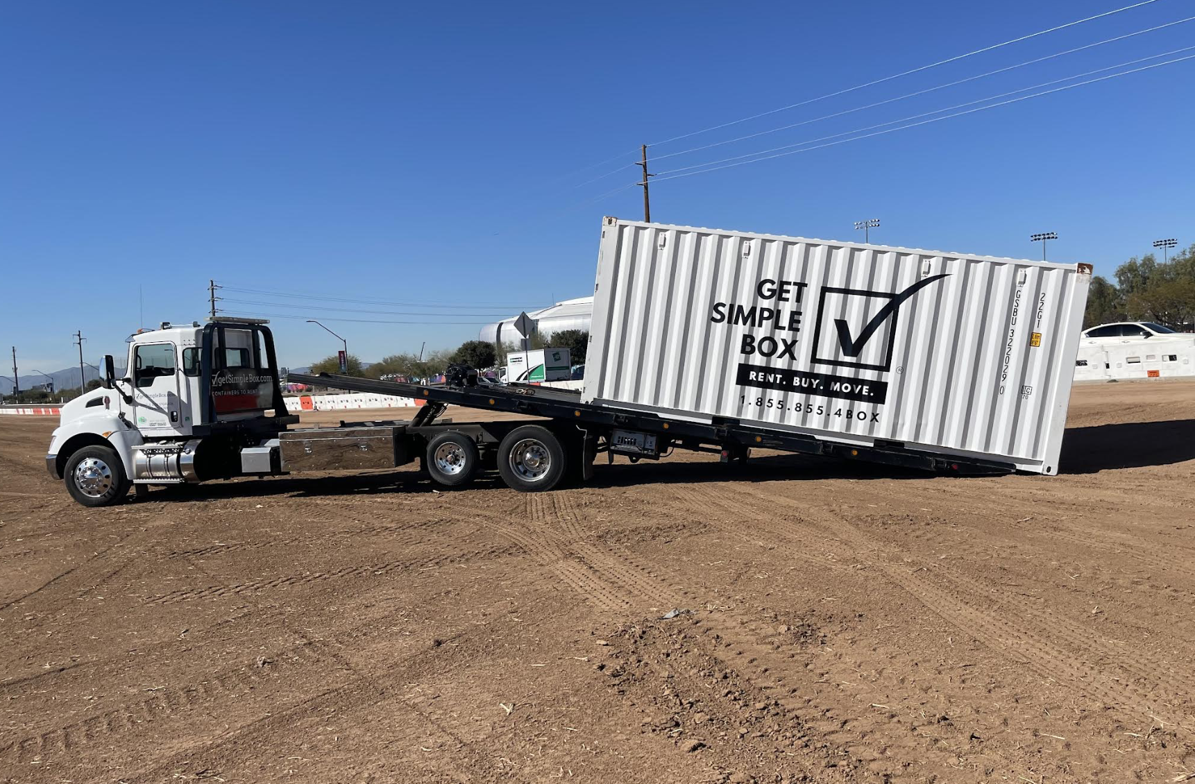 Get Simple Box Employee ready to deliver a new 20 foot shipping container to a client who needed a storage container rental