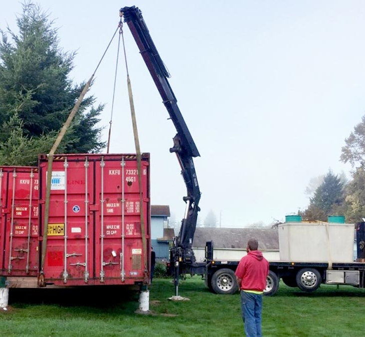 shipping container delivery with a crane in lynden washington