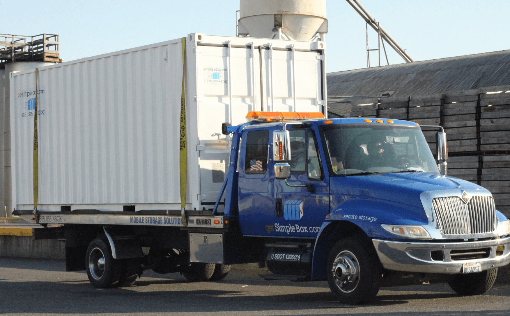 20 foot shipping container on its way being delivered to client