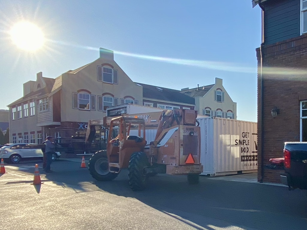A Get Simple Box container at a local construction site, a common revenue stream for your portable storage business opportunity.