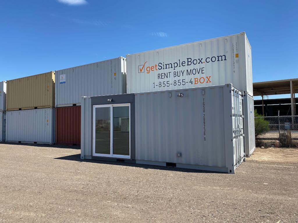 A custom shipping container office modification workspace created by Get Simple Box