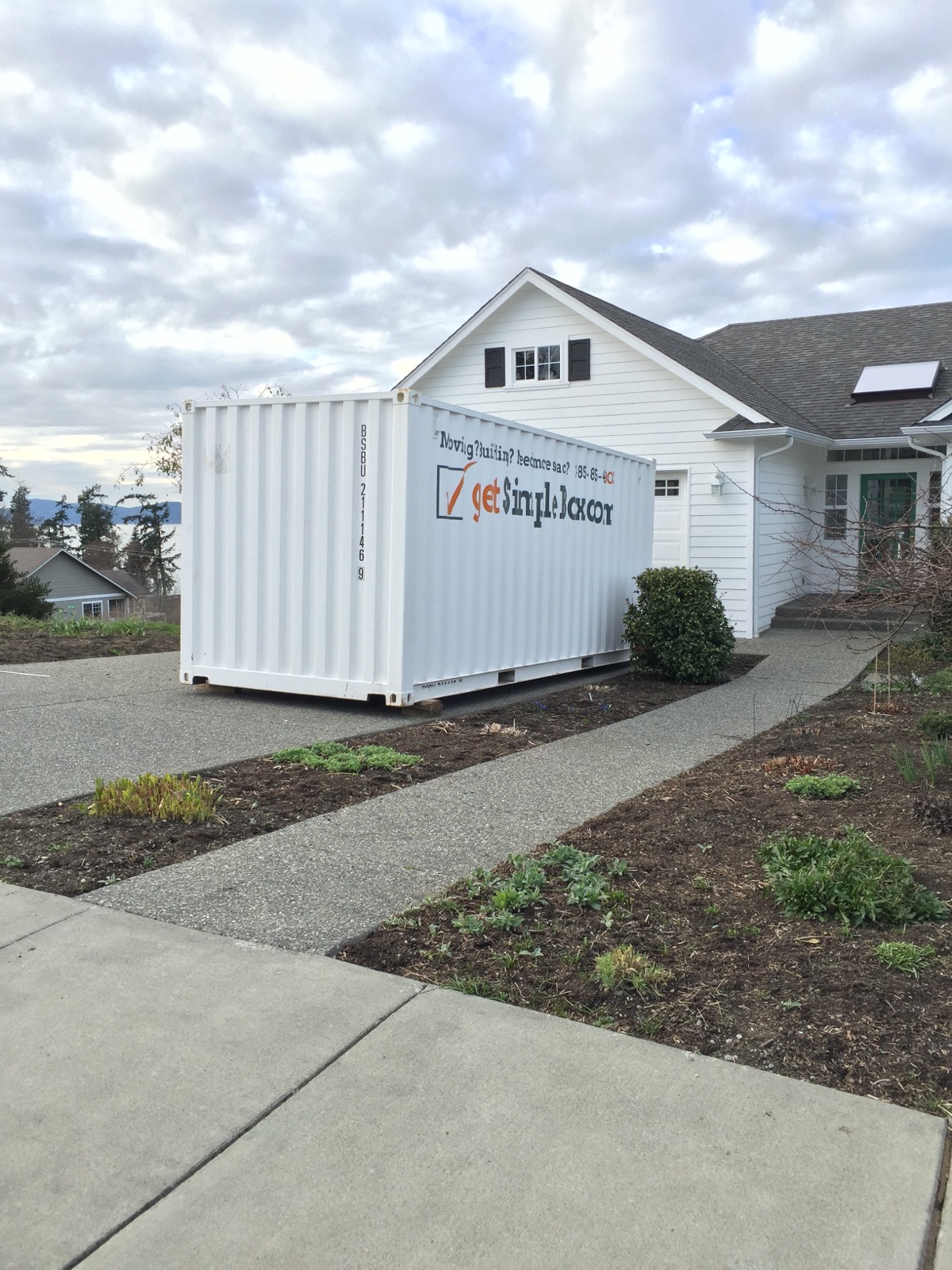 Avoid rusty eyesores on your property. This clean Get Simple Box sitting beside a landscaped backyard provides secure, weather-tight storage that blends into the environment.