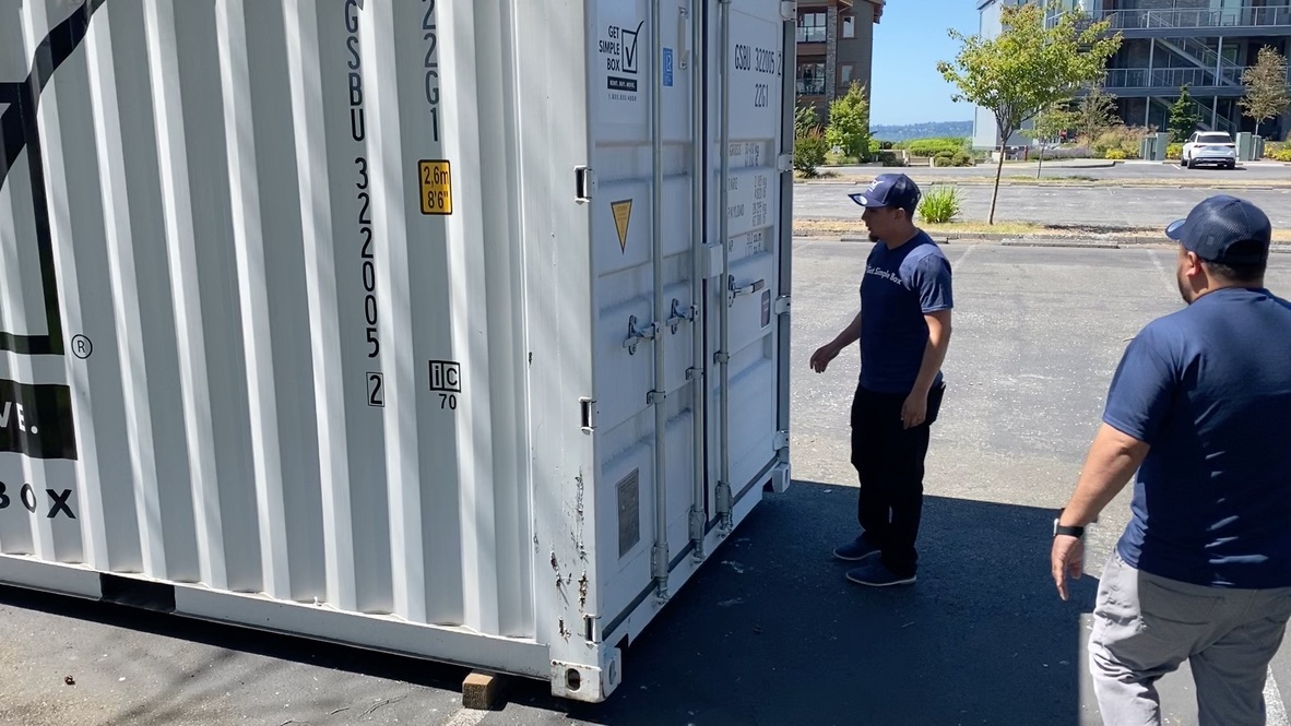 Conducting a quality inspection on our used shipping containers for sale to ensure every unit meets our strict standards for durability and safety