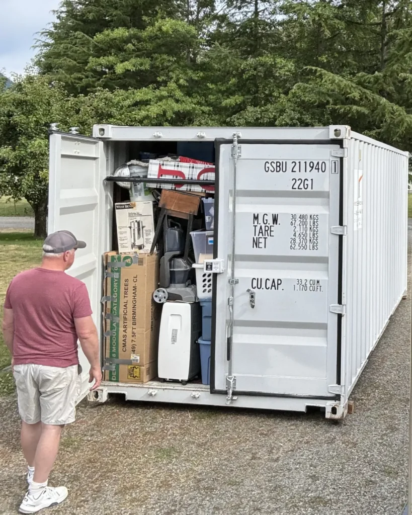 Customer looking at a packed white storage container