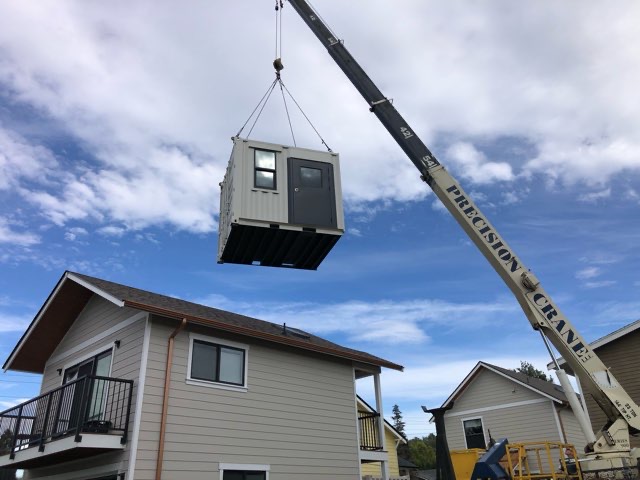 Get Simple Box team delivering and setting up a conex box