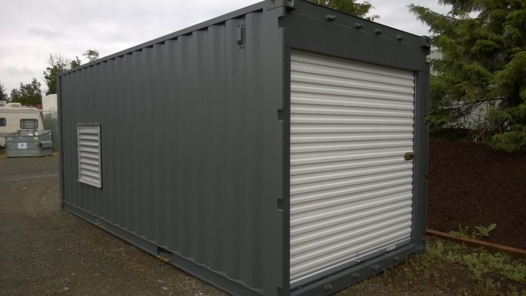 Dark gray container with a roll-up door and wall vents in Whidbey Island, WA