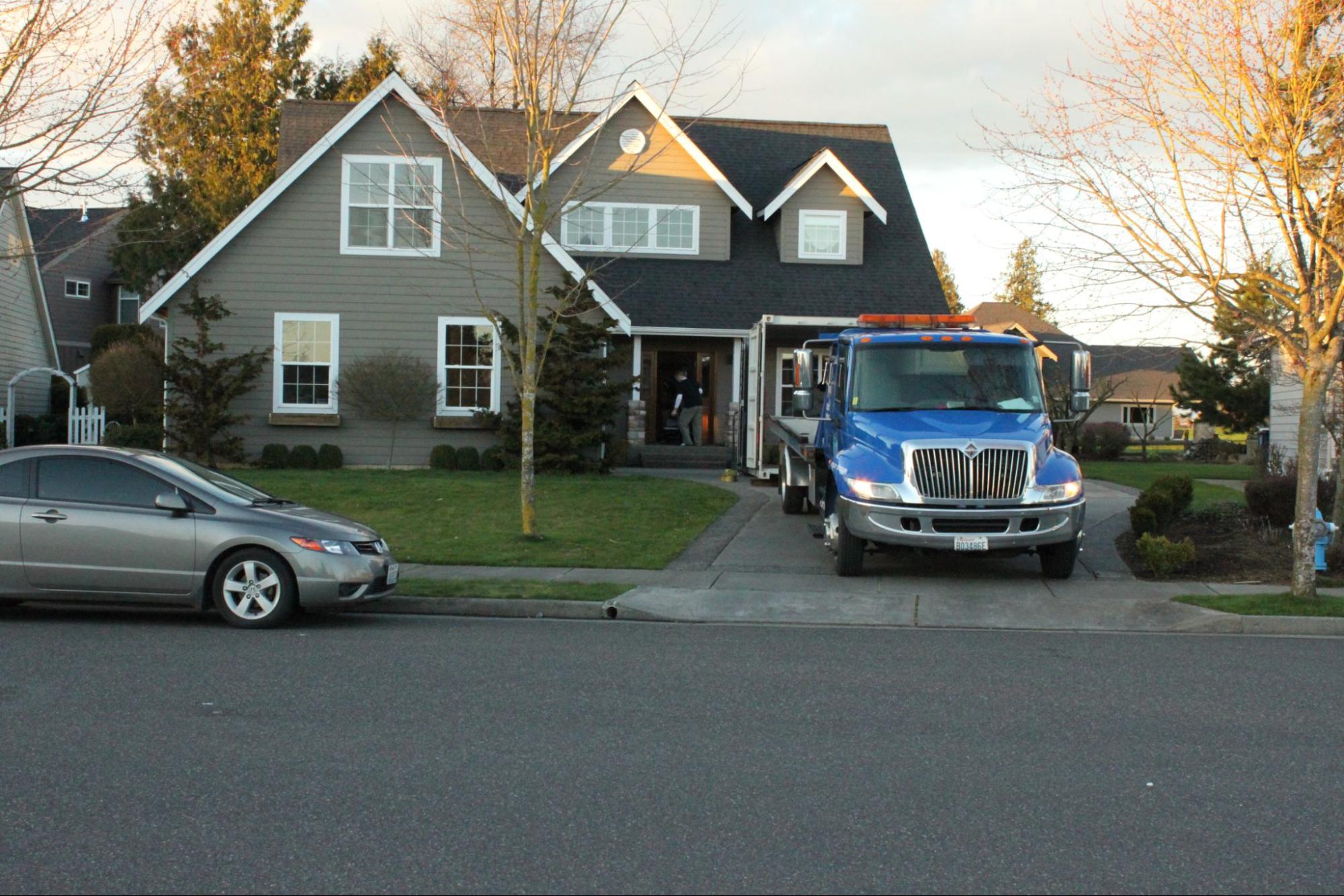 On-site storage container placed on a residential driveway for home renovation storage in Selah, WA