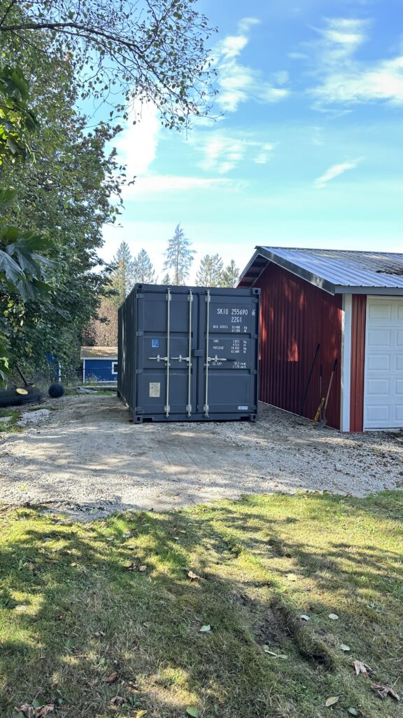 a conex box being used as an outdoor storage space for a local resident of Maple Falls