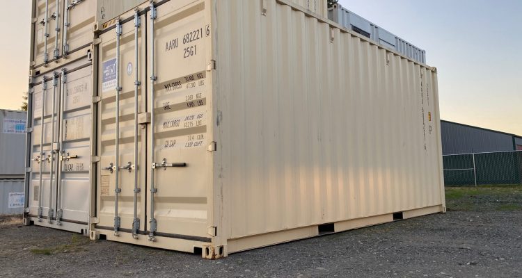 20ft new shipping container parked with other containers in a yard