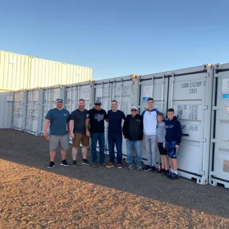 Group standing beside white Get Simple Box storage containers