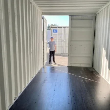 Clean storage container interior with open cargo doors