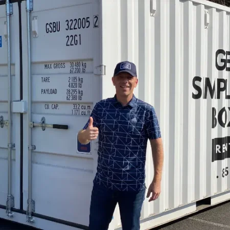 Customer standing beside a white Get Simple Box storage container